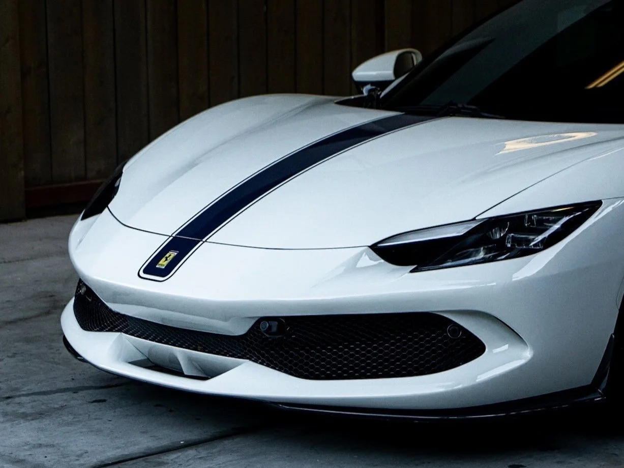 Freshly detailed white Ferrari with mirror finish